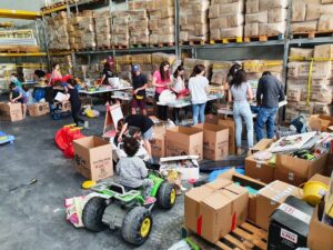 To commemorate Orphan Sunday in Israel (an international day of awareness for orphans and vulnerable children), we hosted a volunteer event at our center to pack boxes of toys, games, and group activities for a children